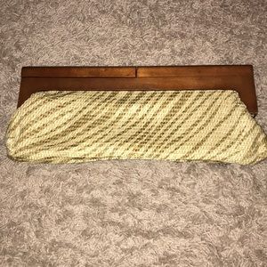 Natural woven material zebra print clutch